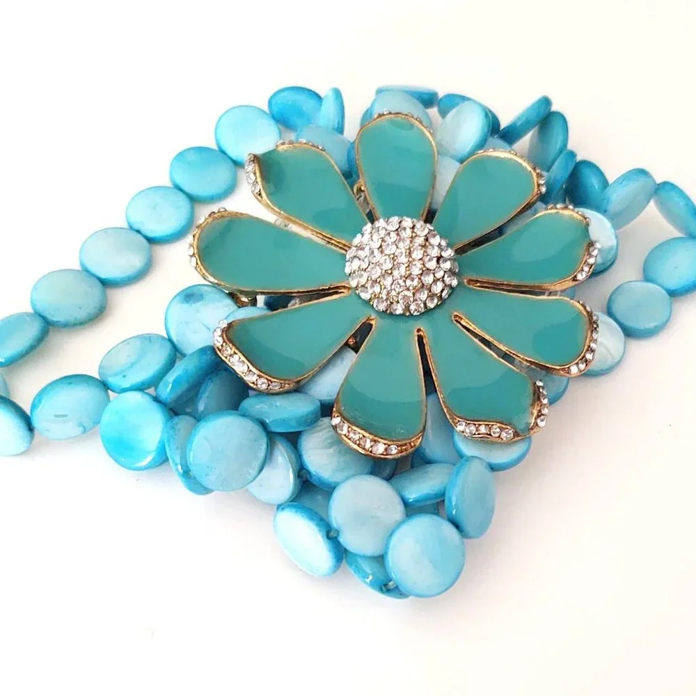 Dyed shell stretch bracelet w/enamel flower& cz's
